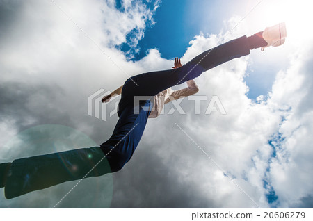 Male who jumps over the camera, low angle 20606279