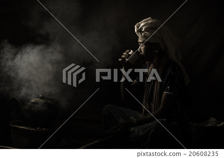 Portrait of Old wrinkled Asian woman drinking the coffee in coun 20608235