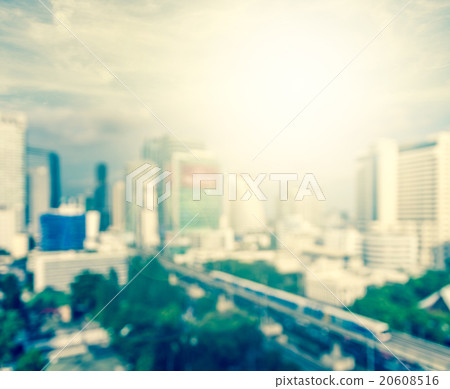 abstract Blurred photo of cityscape with sun background, blur ba abstract Blurred photo of cityscape with sun background, blur ba 20608516