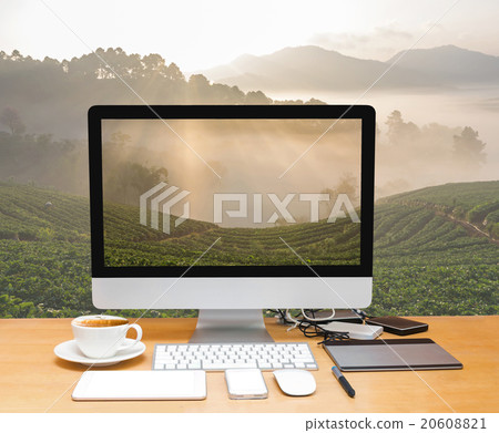 Conceptual image of a workspace with computer desktop on Strawbe 20608821