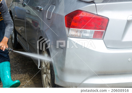 Van Car wash by high pressure cleaners, focus on the car 20608916