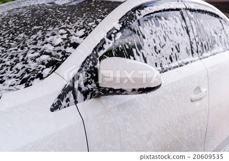 Cleaning the car with foam,car wash shop 20609535