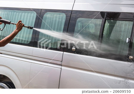 Van Car wash by high pressure cleaners, focus on the car Van Car wash by high pressure cleaners, focus on the car 20609550