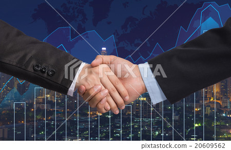 Hand shake between businessman on Trading graph on the cityscape 20609562