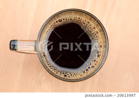 Top view of an cup of coffee with some bubbles. Top view of an cup of coffee with some bubbles. 20613997