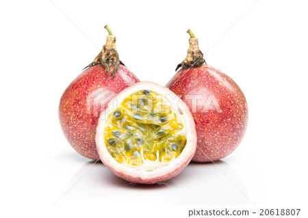 Passion fruits and slice isolated on white. 20618807