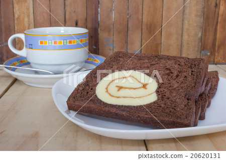 sliced chocolate bread with jam roll cakes sliced chocolate bread with jam roll cakes 20620131