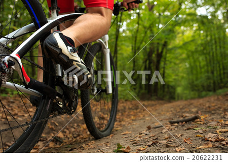 Closeup Bicyclist with His Bicycle in the Summer 20622231