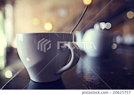 cup of tea at a cafe blurred background 20625757