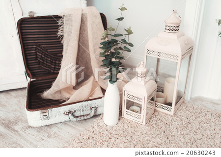 Beautiful vintage white suitcase lies open 20630243