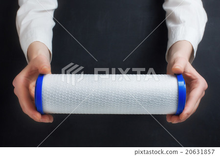 water filter cartridge in human hands water filter cartridge in human hands 20631857