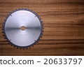 Circular saw blade on wooden background 20633797