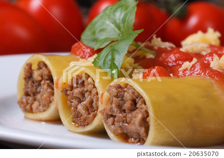 Italian cannelloni pasta with meat, tomato sauce  20635070
