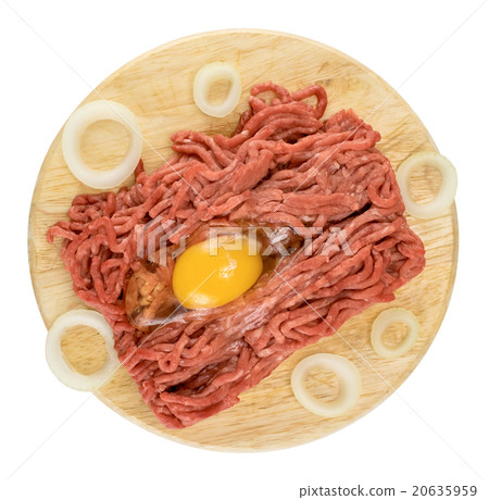 mincemeat with egg and onion on cutting board mincemeat with egg and onion on cutting board 20635959