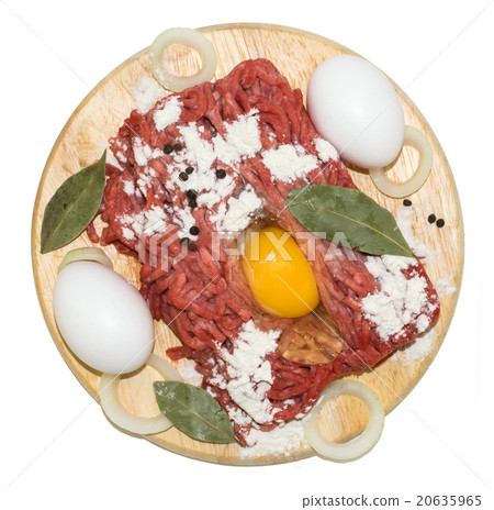 mincemeat with eggs on a cutting board 20635965