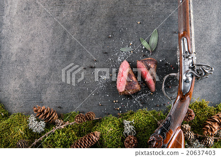 deer or venison steak with antique long gun deer or venison steak with antique long gun 20637403