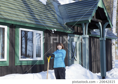 A woman snowing away 20642815