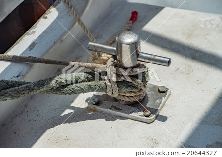 boat bollard detail on blue water background 20644327