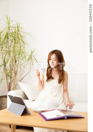 A woman thinking of cooking dishes A woman thinking of cooking dishes 20645559