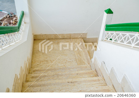 Old staircase leading up towards the light 20646360