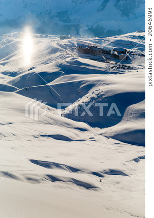 Male skier skiing in fresh snow on ski slope  20646993