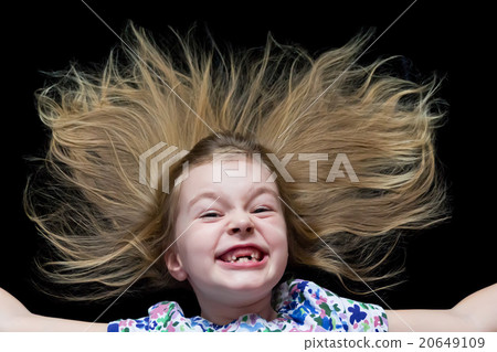 Girl makes faces imitate witch 20649109