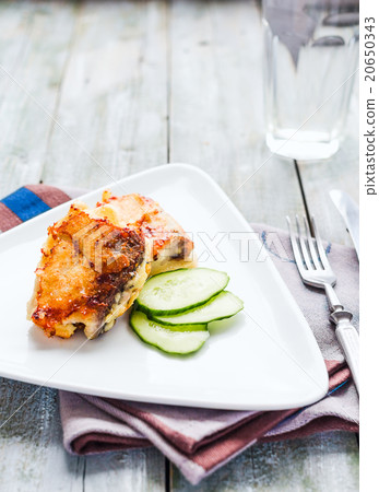 fried mackerel, fish in batter with fresh cucumber 20650343