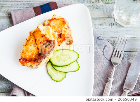 fried mackerel, fish in batter with fresh cucumber 20650349