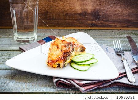 fried mackerel, fish in batter with fresh cucumber 20650351
