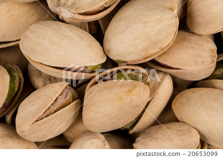 Pistachio nuts arranges as background 20653099