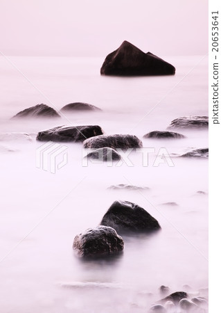 Romantic morning at sea. Big boulders Romantic morning at sea. Big boulders 20653641