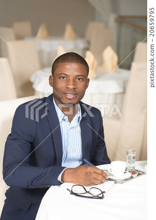 Businessman working in restaurant Businessman working in restaurant 20659795