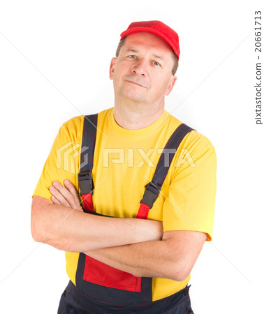 Worker in hat with crossed arms. Worker in hat with crossed arms. 20661713