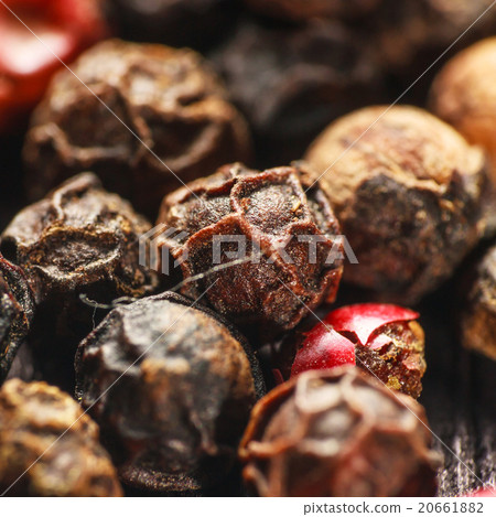 pepper corns on a wooden board pepper corns on a wooden board 20661882