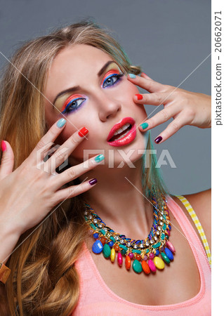 Girl with bright colorful makeup Girl with bright colorful makeup 20662071