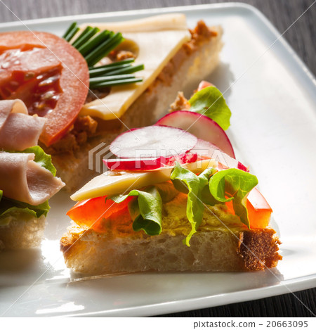 Canapes on table, spring day light 20663095