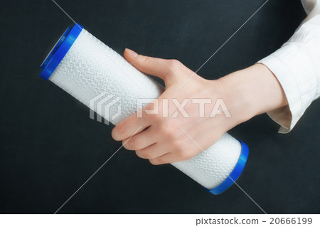 water filter cartridges in human hands  20666199