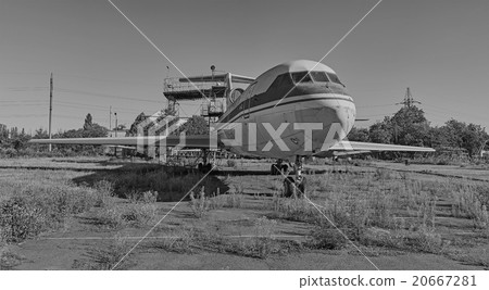 Old aircraft YAK-40 at an abandoned aerodrome Old aircraft YAK-40 at an abandoned aerodrome 20667281