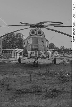 Old helicopter MI-8 at an abandoned aerodrome Old helicopter MI-8 at an abandoned aerodrome 20667314