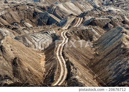 Large excavation site with roads ahead 20676712