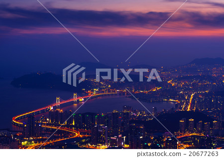 Gwangan Bridge and Haeundae at sunset in Busan. Gwangan Bridge and Haeundae at sunset in Busan. 20677263