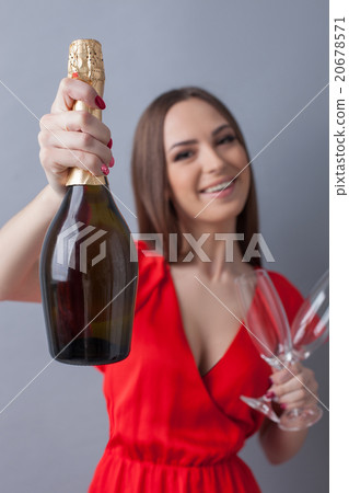 Attractive happy girl is ready to celebrate Attractive happy girl is ready to celebrate 20678571