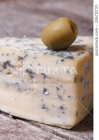 blue cheese and olive on an old wooden table blue cheese and olive on an old wooden table 20678735