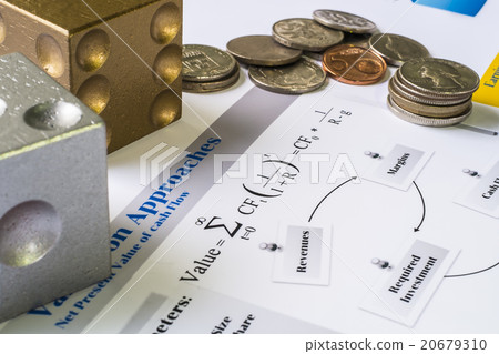 Coins, dice on Valuation measures table and chart. 20679310