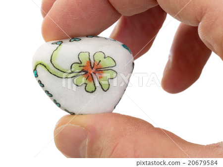 Stone with drawing of a clover four 20679584