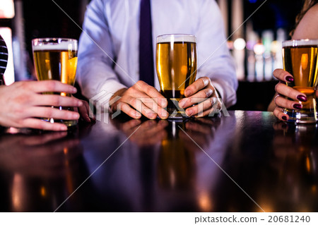 Friends having a beer Friends having a beer 20681240