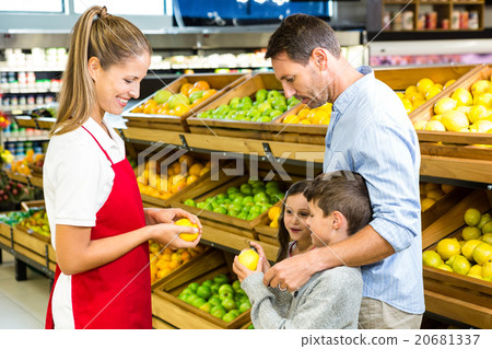 Happy family discussing with worker 20681337