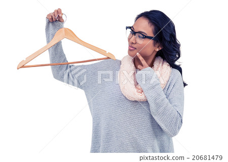 Asian woman holding wooden hanger 20681479