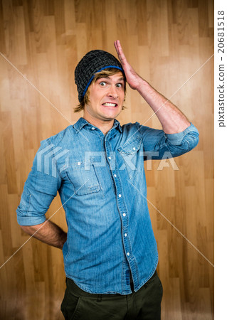 Surprised hipster man staring at camera 20681518