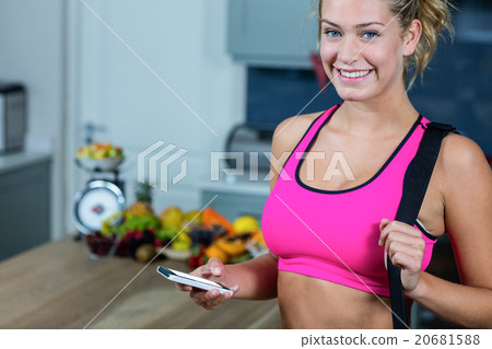 Fit girl texting 20681588